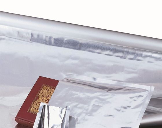 Roll of Marvelseal 360 aluminium barrier foil beside a leather-bound book